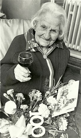 Photo:Susan Sims of Paglesham 100th birthday party. Her maiden name was Nunn and in 1911 she lived at 5 Slate Cottages with husband Ernest and 4 children. The Victor mentioned in the article was her son. She died a few months later in June 1978.